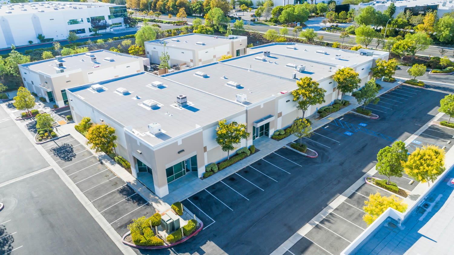 aerial-view-industrial-commerce-office-buildings The Importance of a Good Roof for Your Business from Madewell Restoration